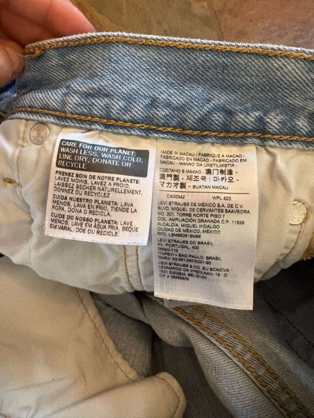Levi's Light Blue Denim Cutoff Shorts with Frayed Hem - Picture 3 of 6